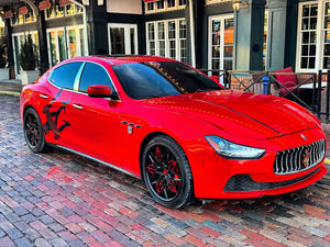 Front angle view of 2016 Maserati Ghibli on custom forged wheels, design your own wheels for luxury sedans