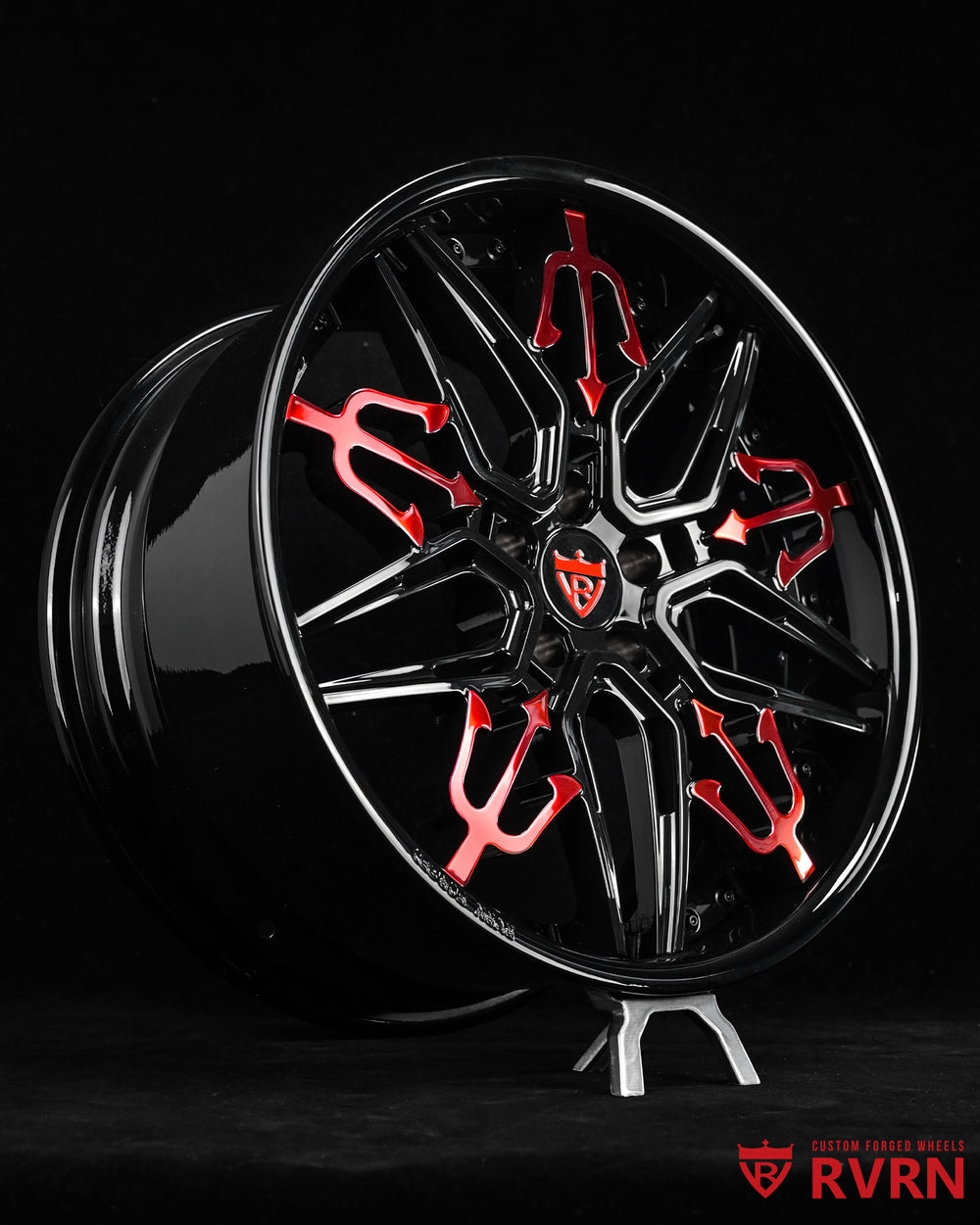 Maserati Ghibli custom 20 inch wheels with red and black rims, showcasing a unique design and high-quality craftsmanship.