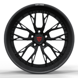 The RVRN RV-DC04 CF displays its matte black Y-spoke forged center and genuine carbon fiber outer rim in a full front view.