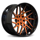 Custom RV-DC11 2-piece forged rims in Gloss Black and Twister Orange, featuring a deep dish directional layout for high-end builds.