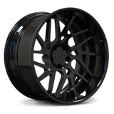 Full Gloss Black RV-DC11 2-piece forged rims, providing a sleek stealth aesthetic with a deep concave turbine design.