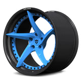 The RV-DC35 CF 2-piece performance wheel with a Rapid Blue directional center and structural dry carbon fiber rim for the Corvette C8 GS.