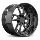 RV-DM02 staggered forged rim in tinted black chrome, designed with a directional turbine face and aggressive deep dish profile for widebody muscle cars.