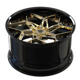 Top view of Cadillac forged wheel showing black deep dish barrel and frozen gold Y-spoke face