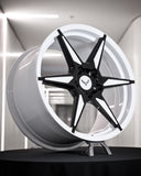 Close-up of RV-MC19 forged wheel showing ivory white spokes and gloss black barrel