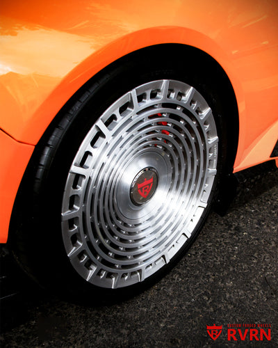 Close-up of RVRN RV-MD02 custom forged monoblock wheel in full brushed aluminum finish with floating center cap and large center cap detail