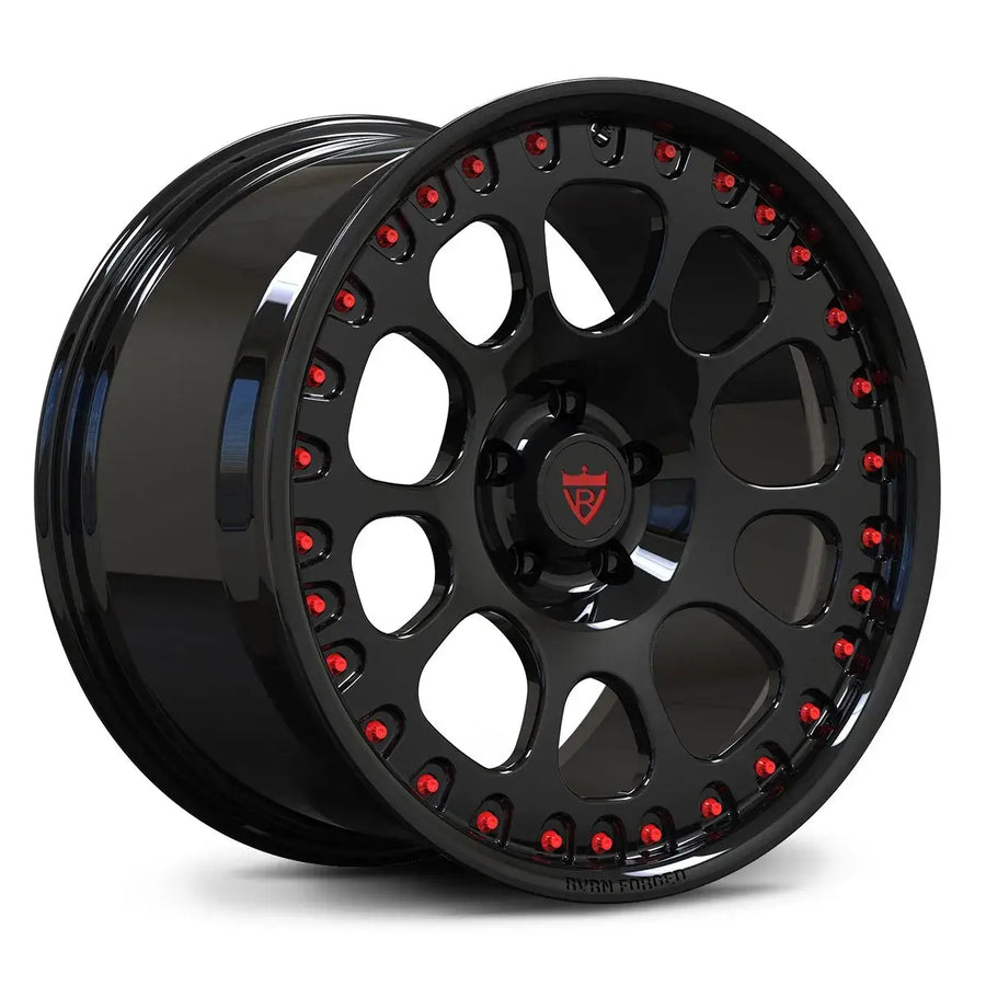 An angled view of the RV-MF03 black aero forged rim featuring red perimeter bolts to achieve a high-end pseudo 2-piece visual effect.