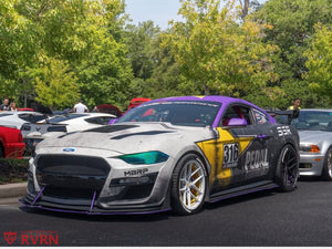 Front three-quarter view of a liveried 2019 Ford Mustang GT Premium on RVRN RV-MR08 wheels, pearl white front and gloss black rear