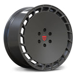 Dark Gunmetal Gray RV-MT03 forged aero wheel, matching the raw stainless steel exoskeleton of the Cybertruck.
