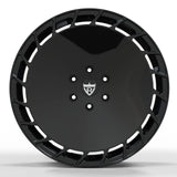 Front view of RV-MT03 matte black aero forged wheel, showcasing the Cyberbeast-inspired solid disk design.