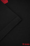 Macro view of the black RVRN T-shirt fabric and double-stitched sleeve hem.
