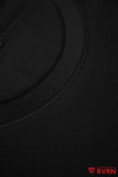 Close-up of the ribbed crew neck and stitching on the black RVRN T-shirt.