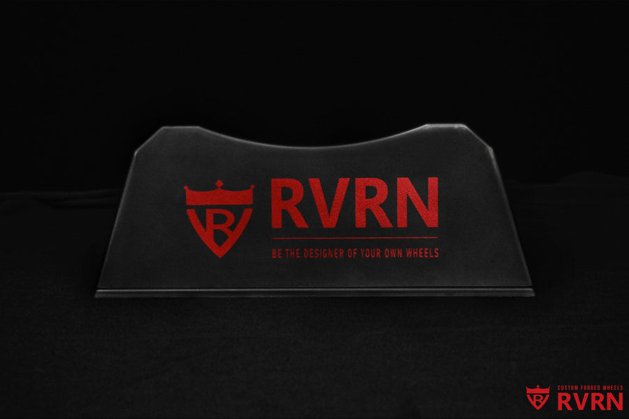 Front view of the black RVRN Custom Forged Wheels display plaque featuring the red RVRN logo and Be the Designer of Your Own Wheels slogan.
