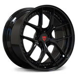 Corvette C8 black wheels, RVRN RV-DB179 full gloss black Y-spoke 2-piece forged wheels with red custom center cap logo angled view.