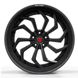 Motorsport-grade engineering wheels for Corvette C8 Z06, RVRN RV-DC06 gloss black face with genuine carbon fiber barrel front view.