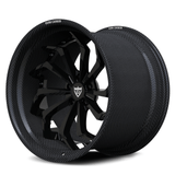 Genuine carbon fiber wheels for Corvette C8 Z06, RVRN RV-DC06 gloss black face with deep-lip carbon fiber barrel side profile view.