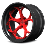 Shelby GT500 carbon fiber wheels, RVRN RV-DS016 gloss red face with genuine carbon fiber barrel fluid twisting angled view.