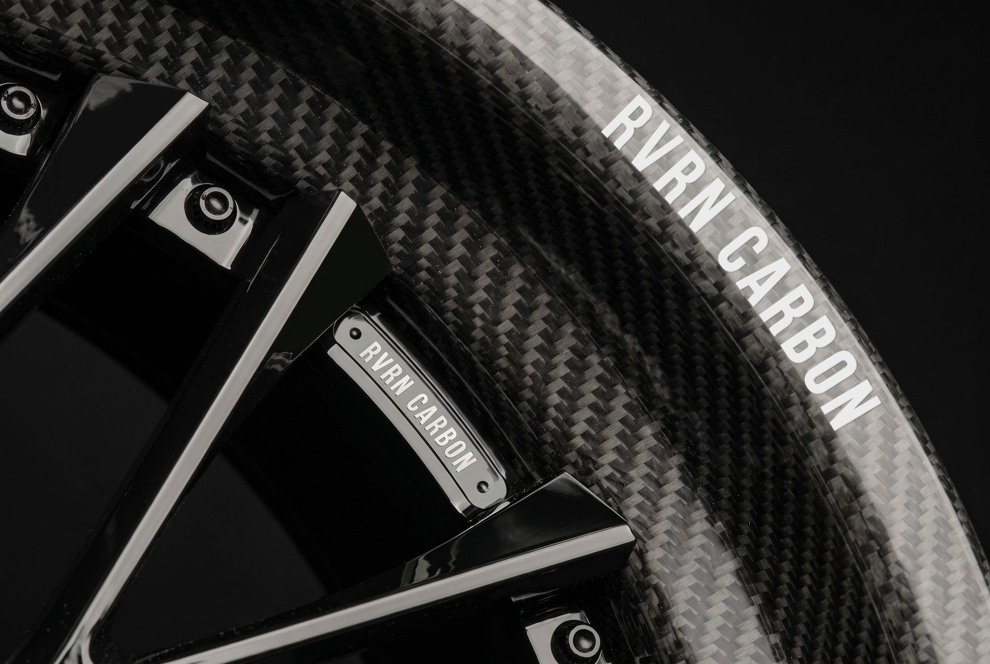 RVRN hybrid carbon fiber series forged wheels showcasing technical precision, lightweight weave overlay, and custom barrel construction for exotic sports cars.