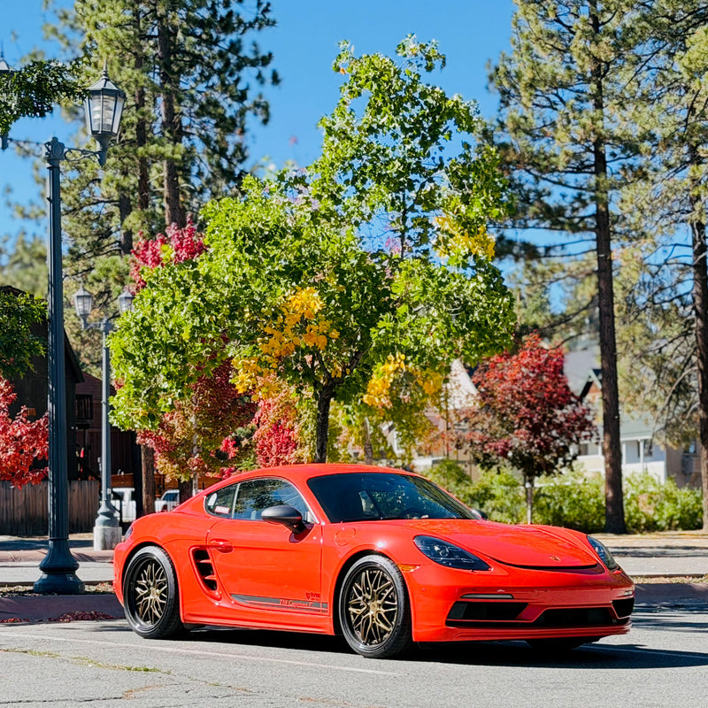 RVRN booth showcasing custom forged wheels at the Porsche Timeline event.