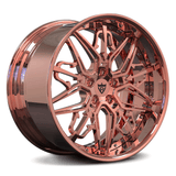 RVRN RM-01 Aston Martin DB12 wheels in polished rose gold, featuring custom forged 2-piece construction, a deep dish profile and distinctive Trident-inspired spoke styling for a refined luxury performance appearance.
