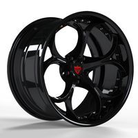 Custom 2 piece forged wheels in black finish, designed for vehicles, high-performance aftermarket rims.