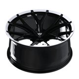 Detailed view of RVRN RV-MR05 black and white Y spoke wheels for Ram 1500 featuring forged monoblock construction