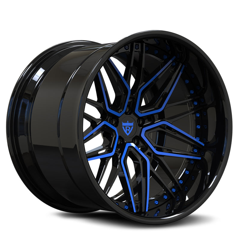 Blue custom forged 2-piece deep dish rim showcasing sleek black finish and unique design.