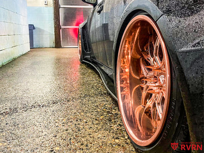 Close-up of rose gold RVRN custom forged wheels on a 2014 Lexus IS350, showcasing premium design and craftsmanship.