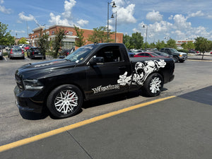 Side profile of a black 2018 Dodge Ram 1500 Sport RT on RVRN RV-C081 concave forged wheels, pearl white spokes and gloss black barrels