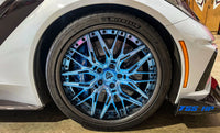 Corvette ZR1 with custom polished blue RVRN forged deep dish wheels, featuring a stylish carbon fiber lip.