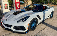 White Corvette ZR1 with polished blue wheels and carbon fiber lip, showcasing C7 ZR1 deep dish custom wheels and ZTK track package.