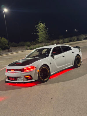 Close-up of gold and black RVRN Forged 22-inch deep dish wheel on Dodge Charger Scat Pack