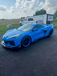 2025 Rapid Blue Corvette Z06 with RVRN forged wheels, showcasing deep concave design and custom performance elements.