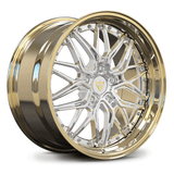 Custom forged deep dish two-piece wheels for Porsche 718 Cayman with a gold finish and unique spoke design.