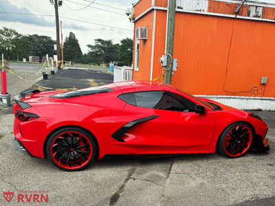 Rear wheel detail of 2023 Corvette C8 Z51 featuring RVRN RV-DC01 21x12 +52mm custom forged wheel in red-black finish.