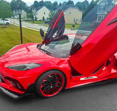 Side profile of Torch Red 2023 Corvette C8 Z51 with RVRN RV-DC01 wheels, directional spokes, 20x9 front and 21x12 rear fitment.