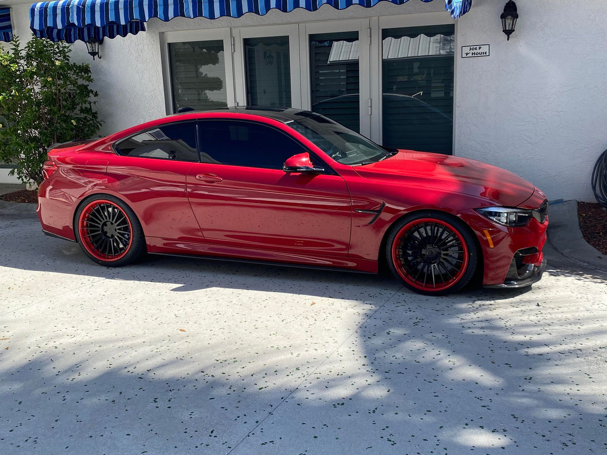 Rear angle view of BMW M4 on custom forged wheels, 20x9.5 front and 20x10.5 rear, made to order performance wheels