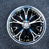 Luxury vehicle fitment of RV-DL09 multi-spoke forged rims highlighting precision alignment and premium stance optimization.