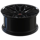 RVRN RV-MP184 black forged monoblock wheel resting face up, showing the Y-spokes and barrel